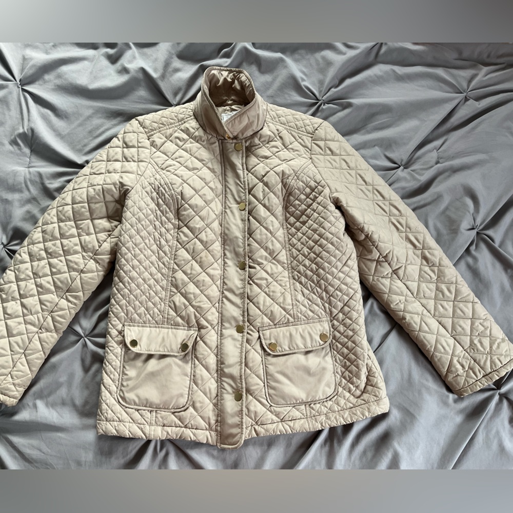 Women’s tan jacket.